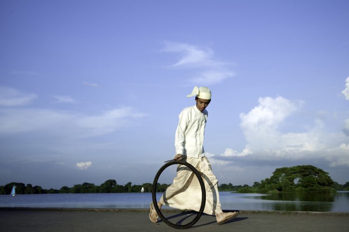 Moe Satt, Bicycle Tire Rolling Event from Yangon: Bank of Innya Lake, 2013, 10 Chancery Lane Gallery Archive