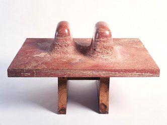 Isamu Noguchi, Double Red Mountain, 1969, Persian red travertine on Japanese pine, 29.2 x 101.6 x 76.8 cm, Photo: Kevin Noble, ©The Isamu Noguchi Foundation and Garden Museum-New York/ARS