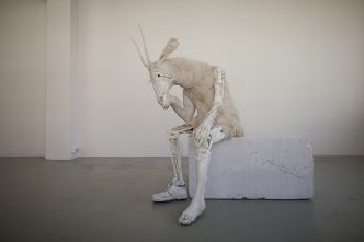 Pawel Althamer, Self-portrait as the Billy-Goat, 2011, Glazed ceramic, plastic, metal, resin cast, goat fur, used shoe, painted Styrofoam plinth, 152 x 152 x 154 cm, Photo: Bartosz Stawiarski, Courtesy the artist and Foksal Gallery Foundation, Warsaw, Whitechapel Gallery