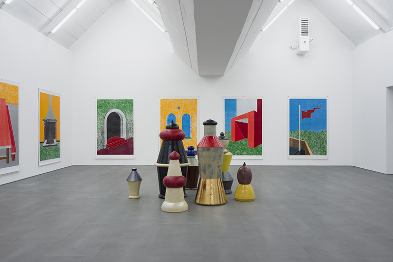 Thomas Schütte, Gartenzwerge, 2015-16, 7 Ceramics, various dimensions. On the wall: Thomas Schütte, Woodcuts, 2011, Set of 9 woodcuts, 253 x 162 cm (each), Photo: Trevor Good, Courtesy the artist and carlier|gebauer