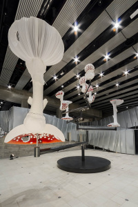 Carsten Höller, Flying Mushrooms, 2015, Installation view, “Carsten Höller: Decision” at Hayward Gallery, London, 2015, Polyester mushroom replicas, polyester paint, synthetic resin, acrylic paint, wire, putty, polyurethane, rigid foam, stainless steel, 5.1 × 8.6 × 8.6 m, Artwork © Carsten Höller. Photo: Ela Bialkowska