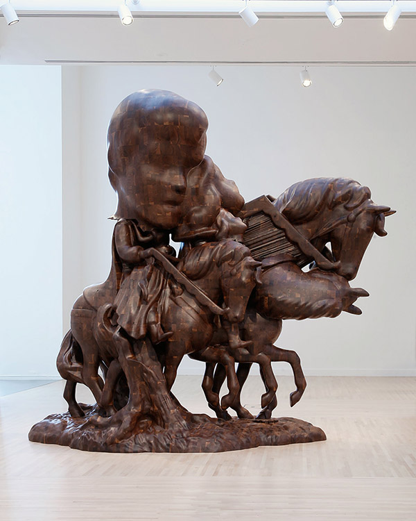 Paul McCarthy, WS - White Snow and Prince on Horseback, Merger, Transformation, Mutation, 2015, Black walnut, 398.1 x 192.4 x 365.8 cm, Installation view, 'Paul McCarthy: White Snow, Wood Sculptures', Henry Art Gallery, University of Washington, Seattle WA-2016, Photo: Mark Woods, © Paul McCarthy, Courtesy the artist and Hauser & Wirth