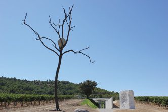 Left: Giuseppe Penone, In bilico, 2012, Bronze, river stone, 1276 x 500 x 200 cm, © Giuseppe Penone, Château la Coste, ADAGP Paris 2017, Courtesy Château la Coste. Right: Giuseppe Penone, Anatomia, 2011, White Marble from Carrara, 300 x 195 x 175 cm, Château la Coste, ADAGP Paris 2017, Courtesy Château la Coste