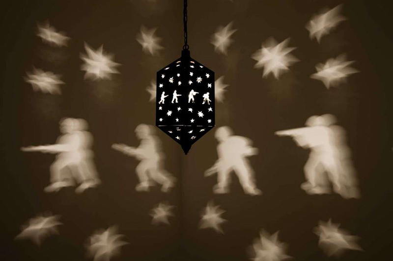 Mona Hatoum, Misbah, 2006-7, Brass latern, chain, light bulb and rotating electric motor, Dimensions variable, Rennie Collection-Vankouver, © Mona Hatoum, Image Courtesy of Fondazione Querini Stampalia Onlus-Venice, Photo: Agostino Osio