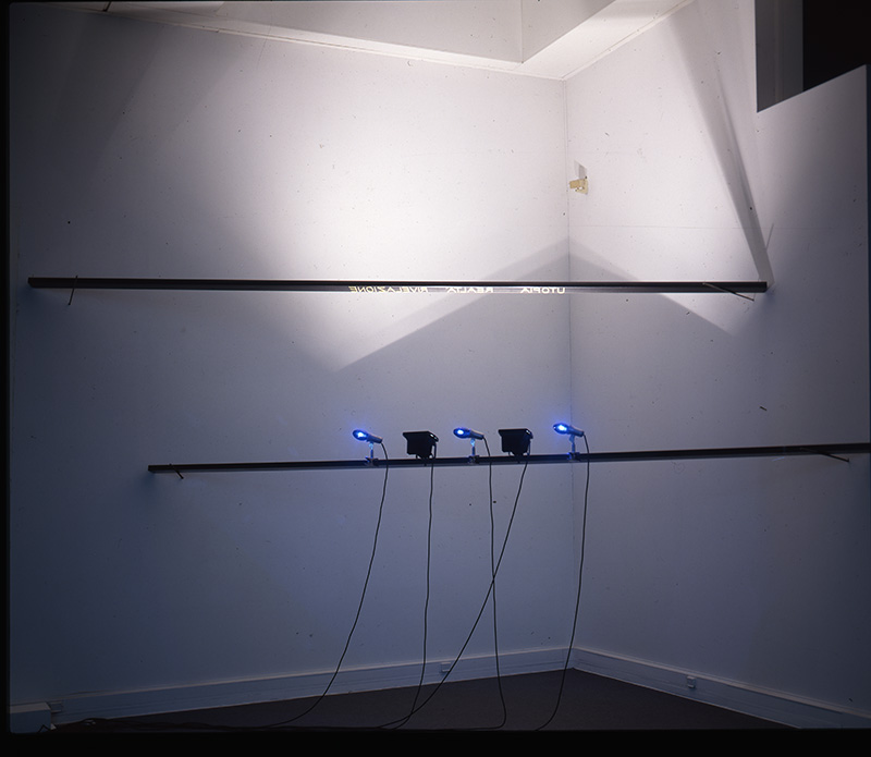 Gilberto Zorio, è Utopia, la realtà, è rivelazione (Is Utopia, the Reality, Is Revelation), 1971, Iron, phosphorescent wax, fluorescent letters, halogen lamps, Wood’s lamps, timer, Dimensions variable, Collection of the artist, Photo: Salvatore Licitra
