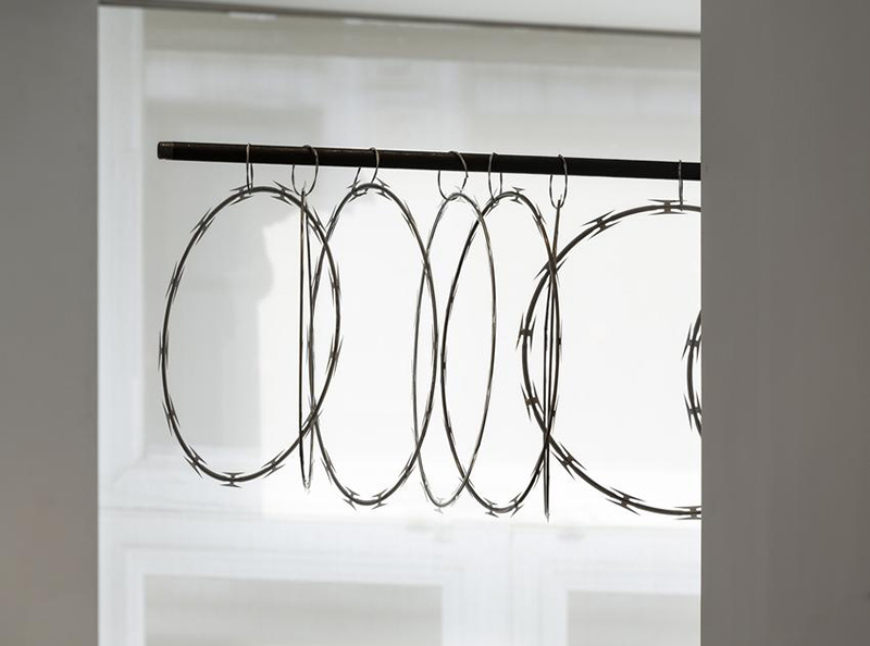 Richard Wentworth, Curtilage (detail), 2017, Razor wire, soldered galvanized cable, steel pipe and steel brackets, 55.9 x 304.8 x 38.7 cm, Peter Freeman, Inc. Archive¬