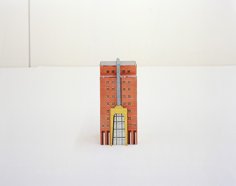 Stefano Graziani, Stefano Graziani - Aldo Rossi, Study model for the tower of the services centre of the Parco tecnologico, Verbania,1993, 22.0 x 6.0 x 6.0 cm, AP142.S1.D228.P4, Aldo Rossi Fonds, Canadian Centre for Architecture, © Fondazione Aldo Rossi, Montreal, 2017, Inkjet-print, 100 x 125 cm, Fondazione Prada Archive