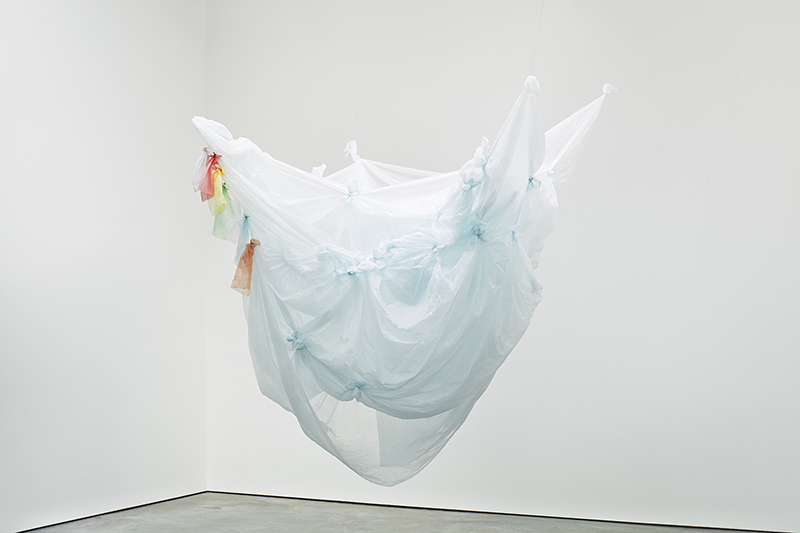 Karla Black, Easily Asked, 2014, Polythene, powder paint, plaster powder, thread, 196 × 161 × 143 cm, Image courtesy of Karla Black and Stuart Shave/Modern Art-London