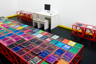 Rasheed Araeen, The Reading Room, 2017, Steel and glass tables, wooden stools, and copies of Third Text journal, Courtesy the artist, Photo: Steffen Harms, ©Photo: Steffen Harms / ZKM Karlsruhe, Van Abbemuseum Archive