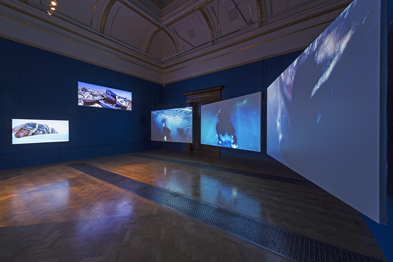 Isaac Julien Western Union: Small Boats, 2007 Five-screen projection, 16mm film transferred to digital, colour, 5.1 surround sound, 18’22’’ © 2017 The Royal Academy of Arts, Photo: Marcus Leith