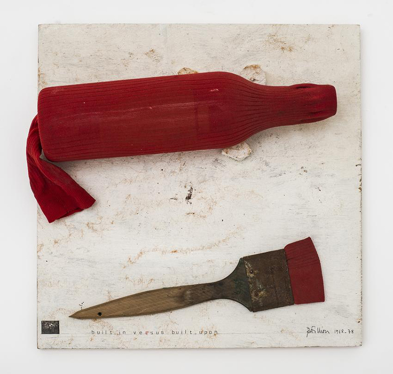 Robert Filliou, Built-in Versus Built-upon, 1968-1978, Paintbrush, sock, bottle, photograph and text on painted wood, 34.9 x 34.9 x 8.9 cm, Peter Freeman Inc. Gallery Archive
