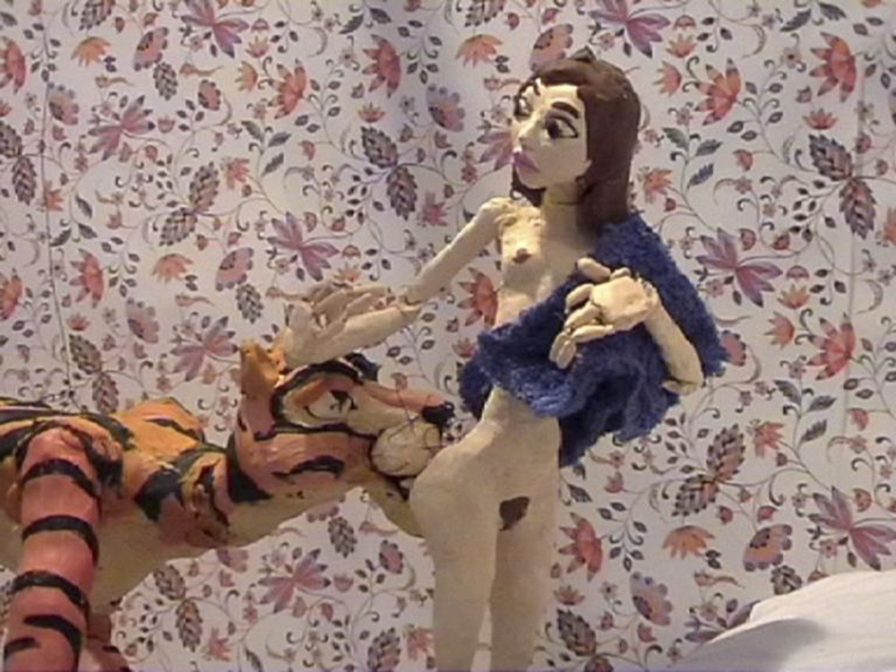 Nathalie Djurberg & Hans Berg, Tiger Licking Girl’s Butt, 2004, Stop motion animation, video, music, 2:15 min, © Nathalie Djurberg & Hans Berg / Bildupphovsrätt 2018, Courtesy the artists and Moderna Museet