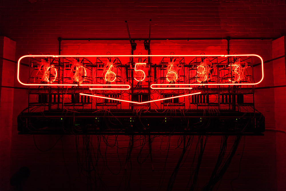 Rachel Ara, This Much I'm Worth (The self-evaluating artwork), 2017, 83 pieces of neon, steel, recycled server room equipment, electronics, computers, IP cameras, programming, 420 × 160 × 90 cm, Courtesy of the artist, Photo: Anise Gallery