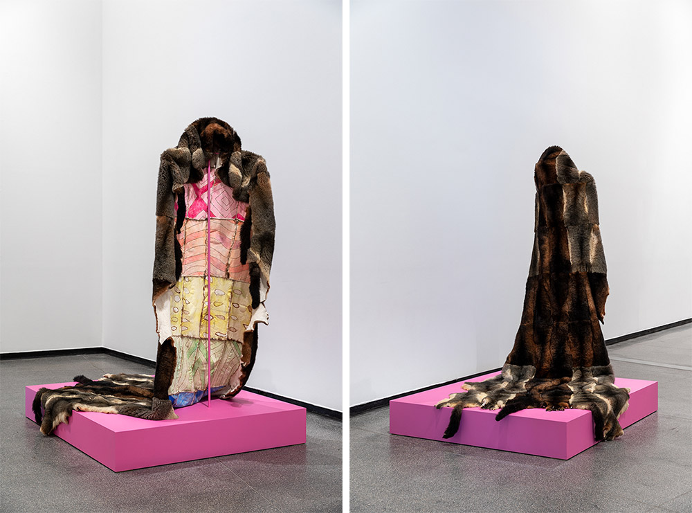 L& R: Peter Waples-crowe, Ngarigo Queen – Cloak of queer visibility, 2018, Possum pelts, waxed linen thread, leather dyes, pokerwork, 380 x 129 cm, Cloak-making advisor: Maree Clarke, Installation view, Australian Centre for Contemporary Art, Photo: Andrew Curtis, Courtesy the artist