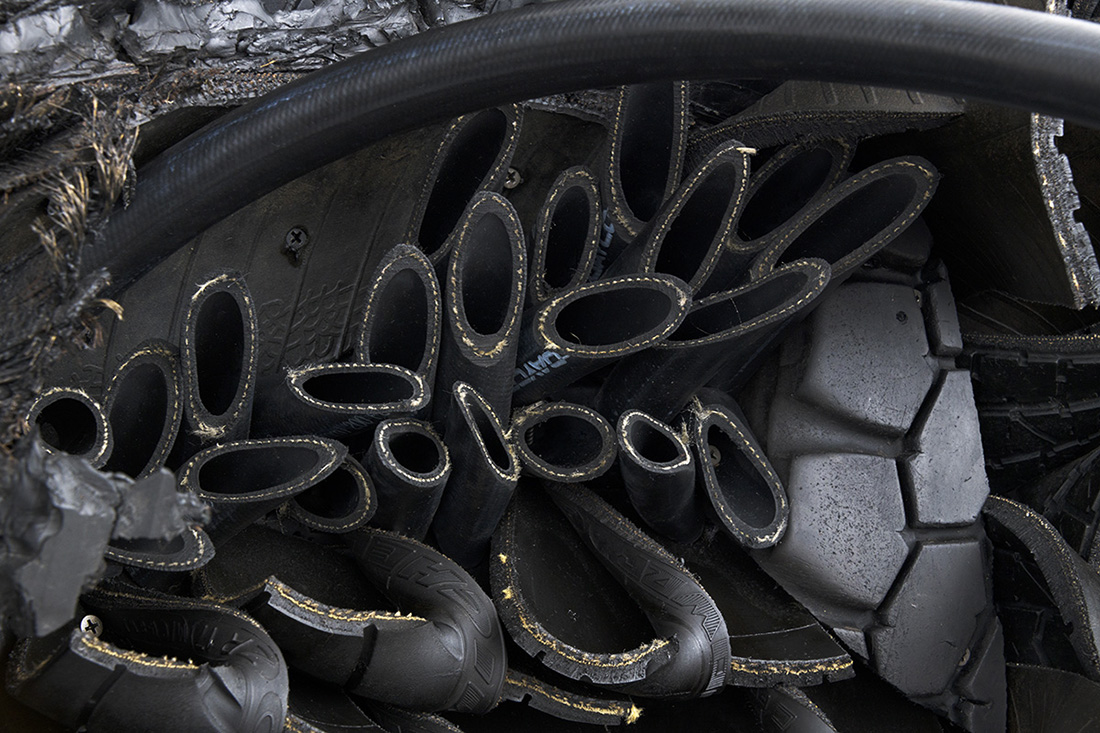 Chakaia Booker, Eminent Domain, 2010, Rubber tires and wood, 139.7 x 193 x 61 cm, © Chakaia Booker, Courtesy the artist and David Kordansky Gallery