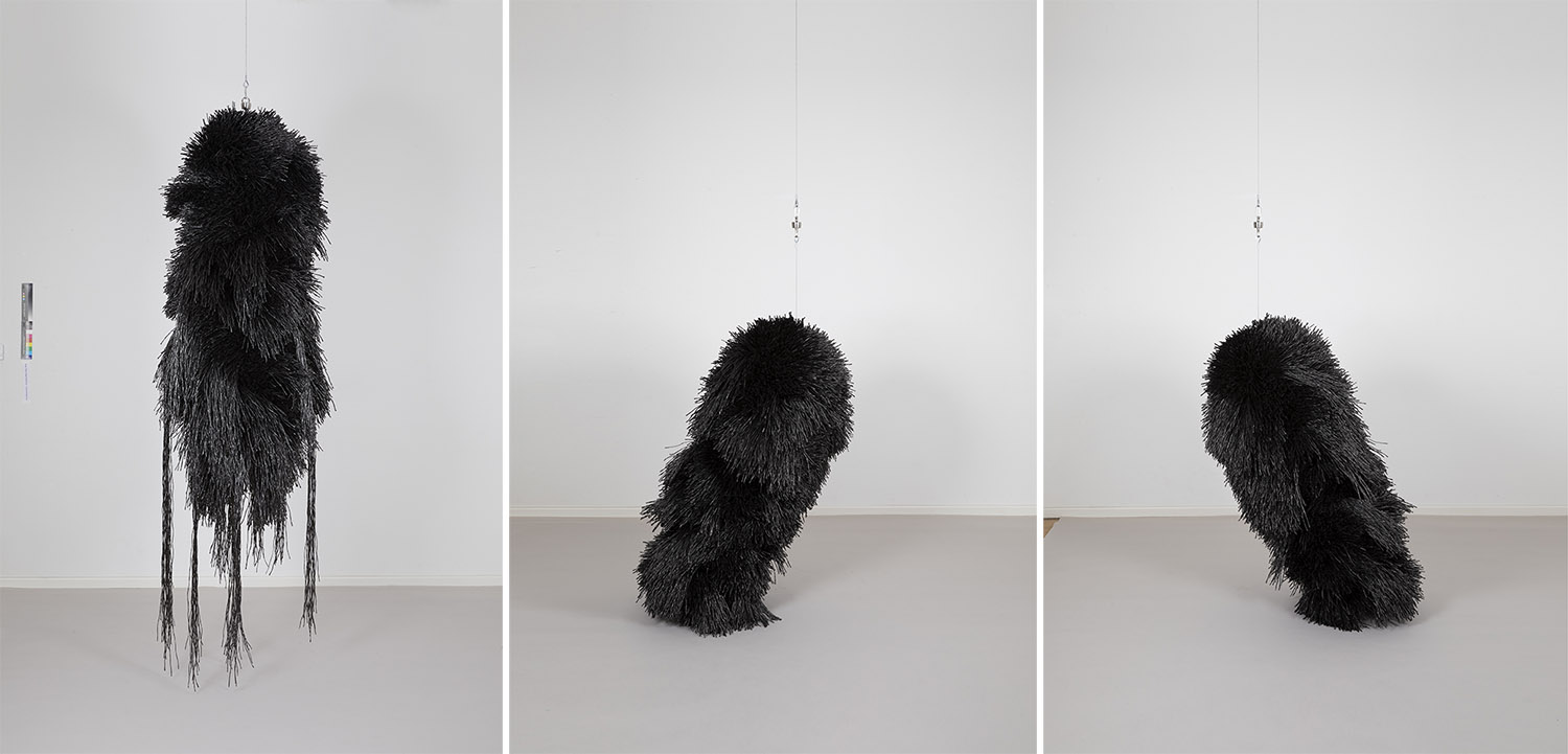 Left: Haegue Yang, The Intermediate – Dangling Hairy Hug, 2018, Powder-coated steel frame, powder-coated metal grid, steel wire rope, plastic twine, 240 x 70 x 73 cm, Courtesy of the artist, Photo: Studio Haegue Yang. Center & Right: Haegue Yang, The Intermediate – Dragged Hairy Hug, 2018, Powder-coated steel frame, powder-coated metal grid, steel wire rope, caster, plastic twine 131 x 55 x 66 cm, Courtesy of the artist, Photo: Studio Haegue Yang
