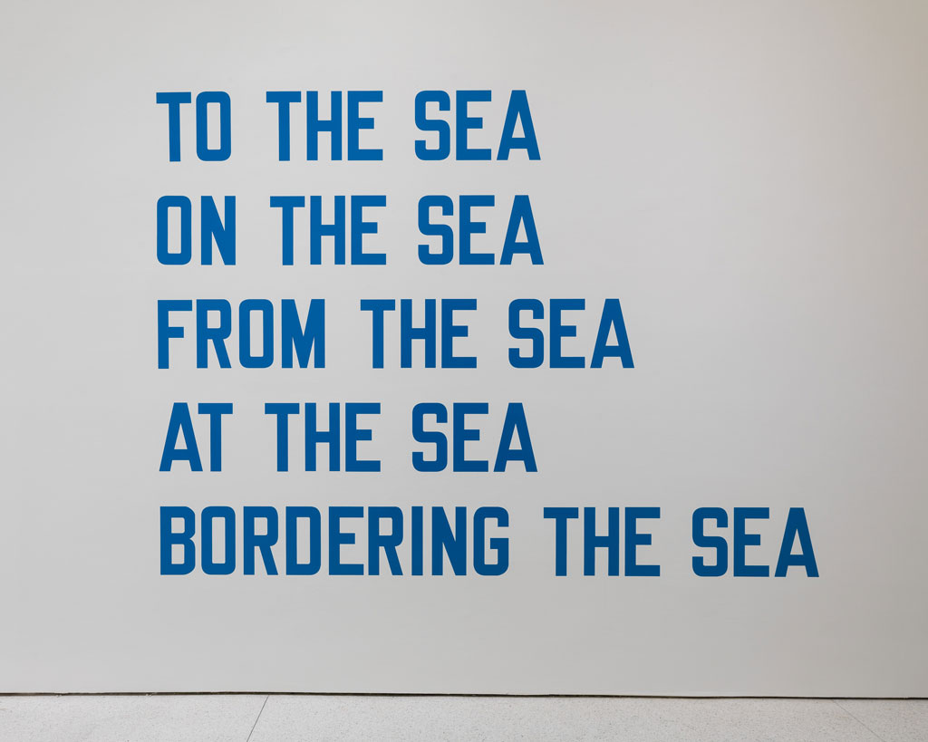 Lawrence Weiner, TO THE SEA / ON THE SEA / FROM THE SEA / AT THE SEA / BORDERING THE SEA, 1970, Language + the materials referred to, dimensions variable, Solomon R. Guggenheim Museum, New York, Panza Collection, Gift 92.4189, © 2019 Lawrence Weiner / Artists Rights Society (ARS), New York