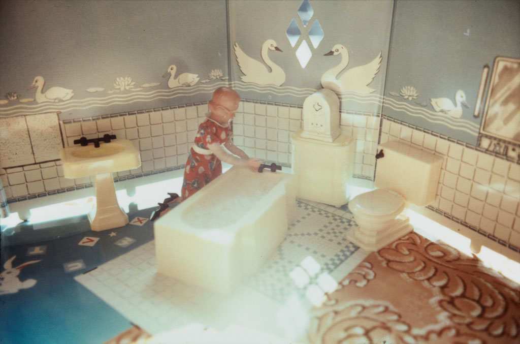 Laurie Simmons, First Bathroom/Woman Kneeling, 1978, Silver dye bleach print, 8.9 x 12.7 cm, Solomon R. Guggenheim Museum, New York, Purchased with funds contributed by the International Director’s Council 2015.37, © Laurie Simmons