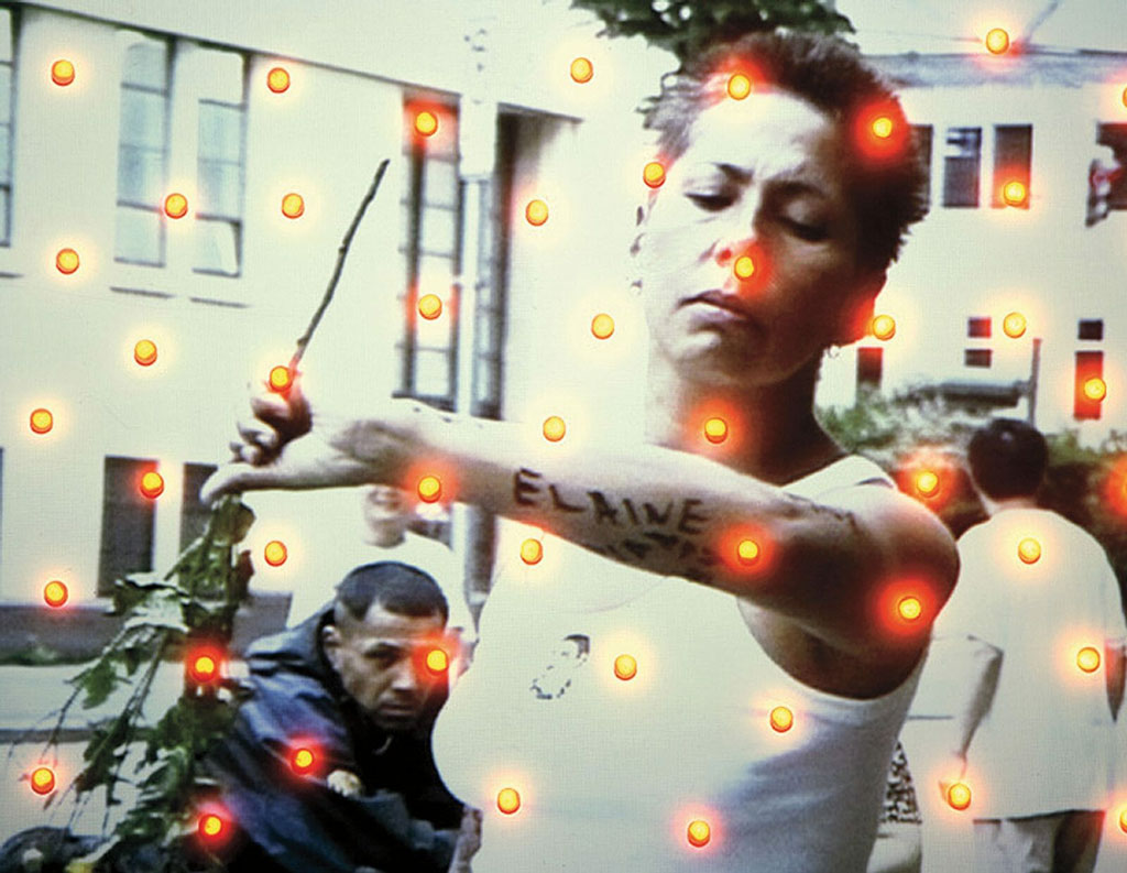 Rebecca Belmore, The Named and the Unnamed, 2002 Video projection, light bulbs, 240 x 316.2 x 31.8 cm, Collection of the National Gallery of Canada, purchased 2009. 42607, © Rebecca Belmore, Photo: Howard Ursuliak/Morris and Helen Belkin Art Gallery