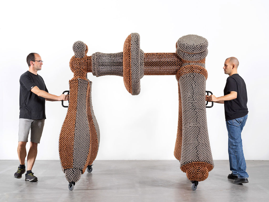 Haegue Yang. Sonic Handles – The Fourth Force from the installation Handles. 2019. Powder-coated steel frame, mesh, and handles, casters, copper- and nickel-plated bells, and metal rings, 212 × 195 × 213 cm. Commissioned for the Marron Atrium by The Museum of Modern Art, New York. © Haegue Yang and Greene Naftali, New York. Photo: Nick Ash