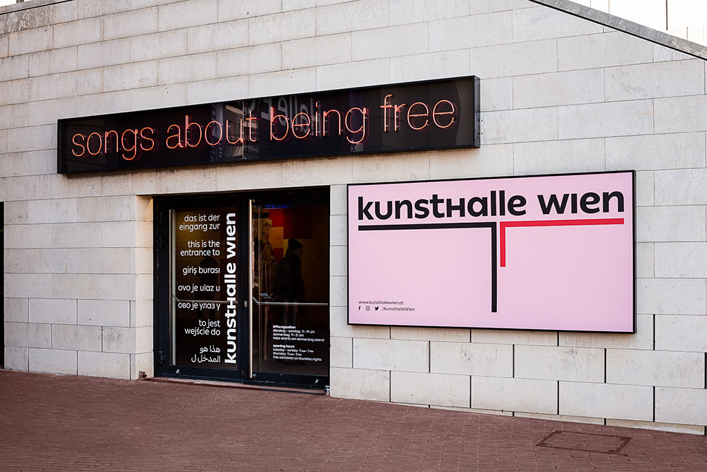 Installation view: ... of bread, wine, cars, security and peace, Kunsthalle Wien 2020, photo: Jorit Aust: Tim Etchells, Being Free, 2020, courtesy the artist; Vitrine, London/Basel; Jenkins Johnson Gallery, San Francisco/New York & Ebensperger-Rhomberg, Berlin/Salzburg