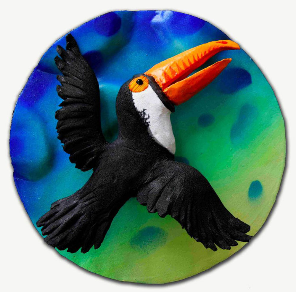 Piero Gilardi, Tucano in volo, 2020, Polyurethane foam, under plexiglas cover, 51 x 51 x 20,5 cm; diam : 50 cm, unique, © Piero Gilardi, Courtesy the artist and Michel Rein Gallery