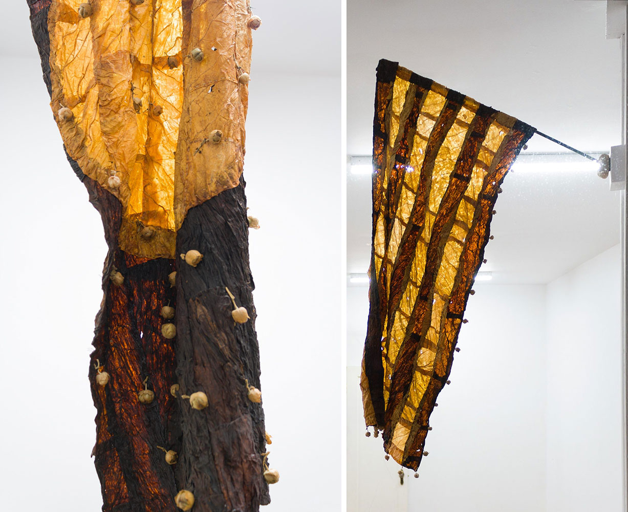 Left: Gabrielle L’Hirondelle Hill. Disintegration (detail). 2019. Virginia tobacco, Perique tobacco, seed pods, thread, and found pole, 43 × 18 1/4″ / 109.2 × 46.4 cm. Courtesy the artist and Unit 17, Vancouver, and Cooper Cole, Toronto. © Gabrielle L’Hirondelle Hill Right: Gabrielle L’Hirondelle Hill. Dispersal. 2019. Virginia tobacco, Perique tobacco, thread, seed pods, support stocking, and found pole, 43 × 14 5/16″ / 109.2 × 36.4 cm. Courtesy the artist and Unit 17, Vancouver, and Cooper Cole, Toronto. © Gabrielle L’Hirondelle Hill