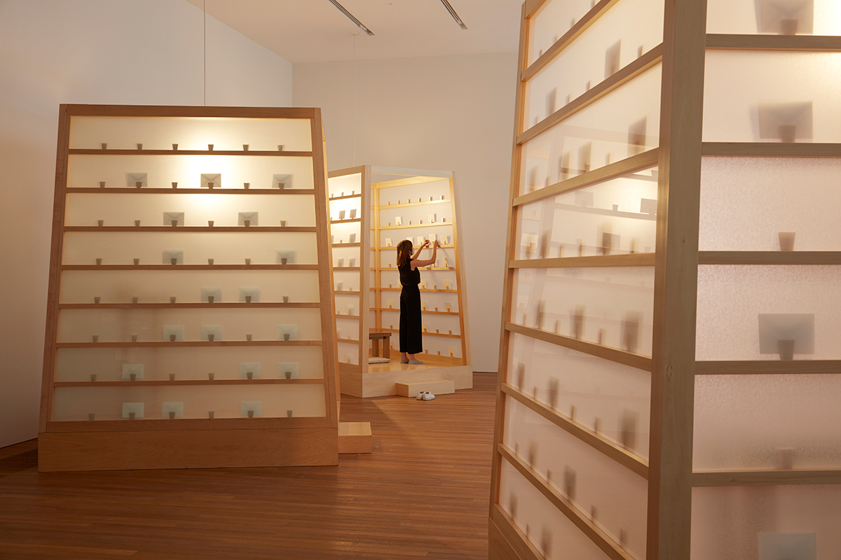 Lee Mingwei, The Letter Writing Project, 1998, Plywood, glass, acrylic, lighting, paper, and pencil, Dimensions variable, © Lee Mingwei, Photo: Lok Cheng and Dan Leung, Courtesy M+ Museum