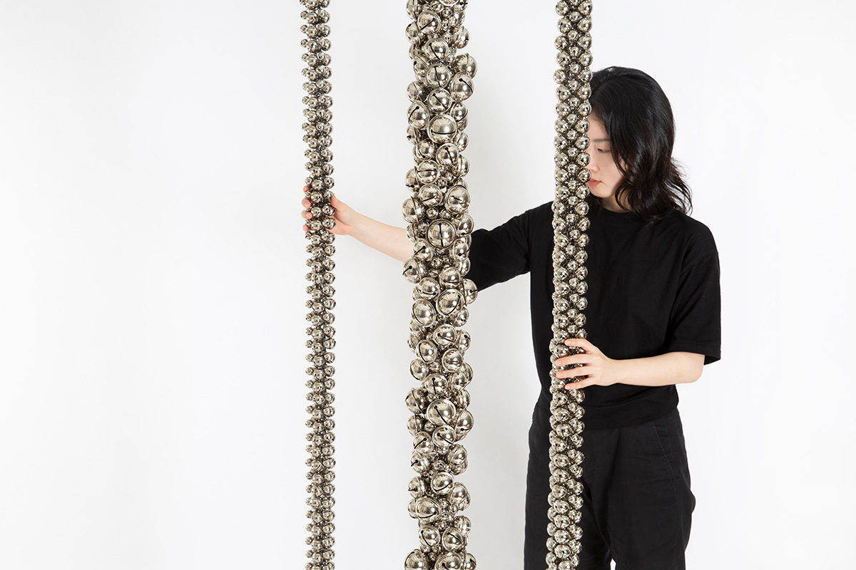 Haegue Yang, Sonic Rescue Ropes, 2021, Nickel-plated bells, stainless steel chains, and split rings, Commissioned by M+, 2021