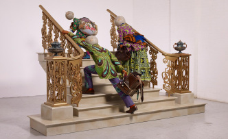 Yinka Shonibare, Moving Up, 2021. Three fibreglass mannequins, Dutch wax printed cotton textile, bespoke hand-painted globes, brass, steel, silk, leather, cotton, hemp, felt, paper, wood, paint. © Yinka Shonibare CBE 2021. Courtesy the artist and James Cohan, New York. Photography: Stephen White & Co.