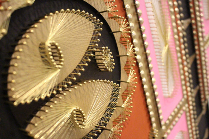 Glendalys Medina, The Sun (El Sol) [detail], 2020, Paint, ink, oil pastel, thread and nails on wood, 42 x 56 inches, 106.7 x 142.2 cm, © Glendalys Medina, Courtesy the artist and Lehmann Maupin Gallery