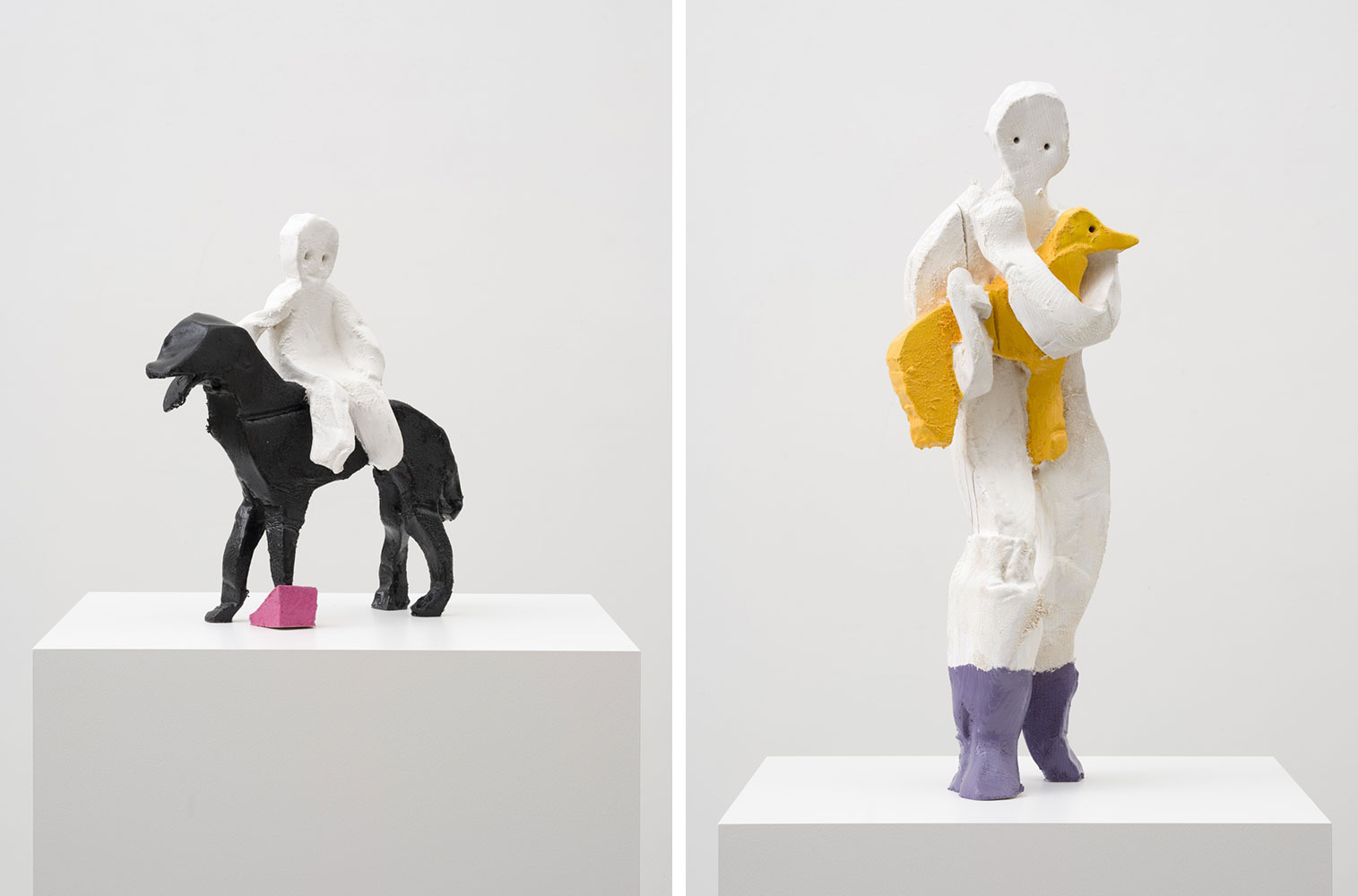 Left: Valentin Carron, Baby and Dog, 202, larch wood, enamel paint, 20 1/2 x 19 1/2 x 8 inches, (52.1 x 49.5 x 20.3 cm), unique in a series of 3 with 1 AP, © Valentin Carron, Courtesy the artist and David Kordansky Gallery Right: Valentin Carron, Adult and Dog, 2022, larch wood, enamel paint, 35 1/2 x 12 1/2 x 9 1/2 inches, (90.2 x 31.8 x 24.1 cm), unique in a series of 3 with 1 AP, © Valentin Carron, Courtesy the artist and David Kordansky Gallery