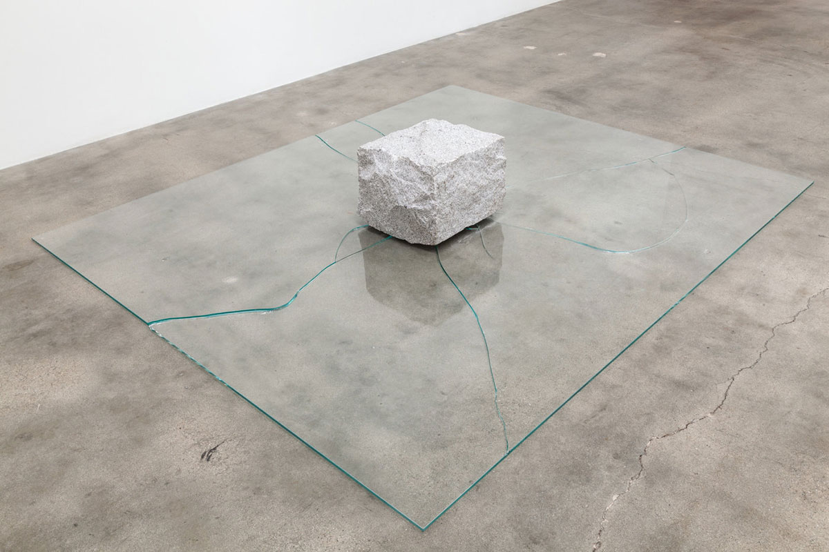 Lee Ufan, Relatum (formerly Phenomena and Perception B), 1969/2012 Glass, stone, Stone: 14 x 20 x 14 1/2 inches; Glass: 3/8 x 78 3/4 x 94 1/2 inches, © Lee Ufan, Courtesy the artist and Blum & Poe Gallery