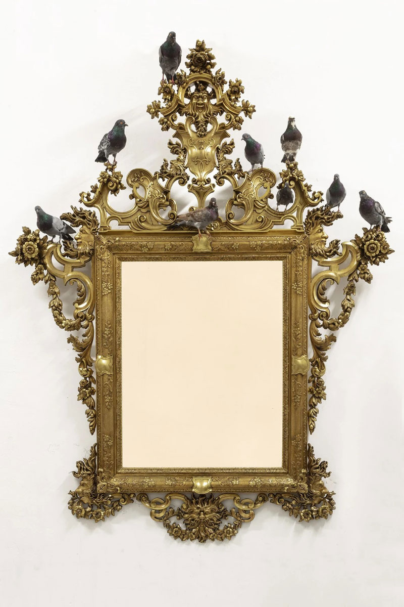 Maurizio Cattelan, Nothing, 2021, Wooden frame, nine taxidermied pigeons, 24-karat gold-plated stainless steel,245 × 190 × 40 cm, Photograph by Zeno Zotti, Courtesy the artis