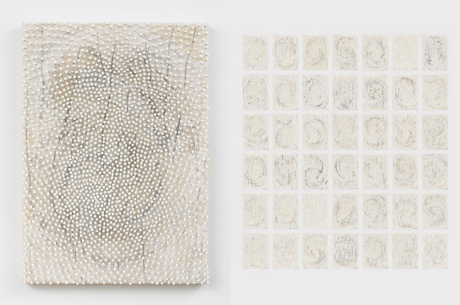 Left: Günther Uecker, Shield, 2022, Paint, nails, and graphite on canvas laid down on wood, 41 3/8 x 29 1/2 inches (105.1 x 75 x 10.5 cm), © Günther Uecker, © Artists Rights Society (ARS), New York / VG Bild-Kunst, Bonn, Courtesy the artist and LGDR GalleryRight: Günther Uecker, Swabs, 2022, Graphite and paint on paper in 42 parts, Each: 13 3/4 x 9 13/16 inches (35 x 25 cm), © Günther Uecker, © Artists Rights Society (ARS), New York / VG Bild-Kunst, Bonn, Courtesy the artist and LGDR Gallery