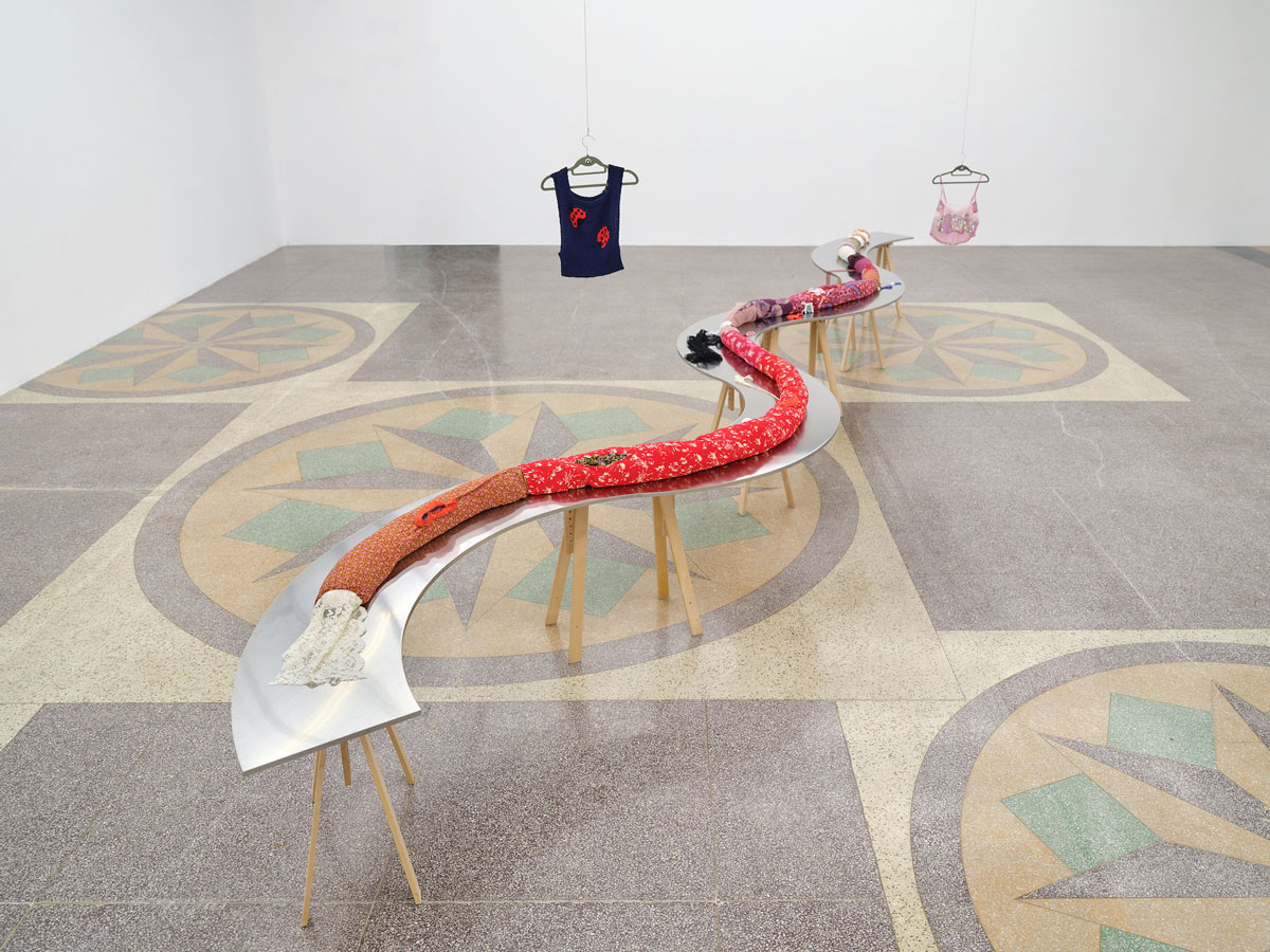 Cong, The Squirrel’s Room, 2022-2023, Fabrics, polyester, metal buttons, cowries, Length overall: 830 cm, Variable width range: 8 – 18 cm, Dimensions variable, © Cong, Courtesy the artist and Antenna Space Gallery