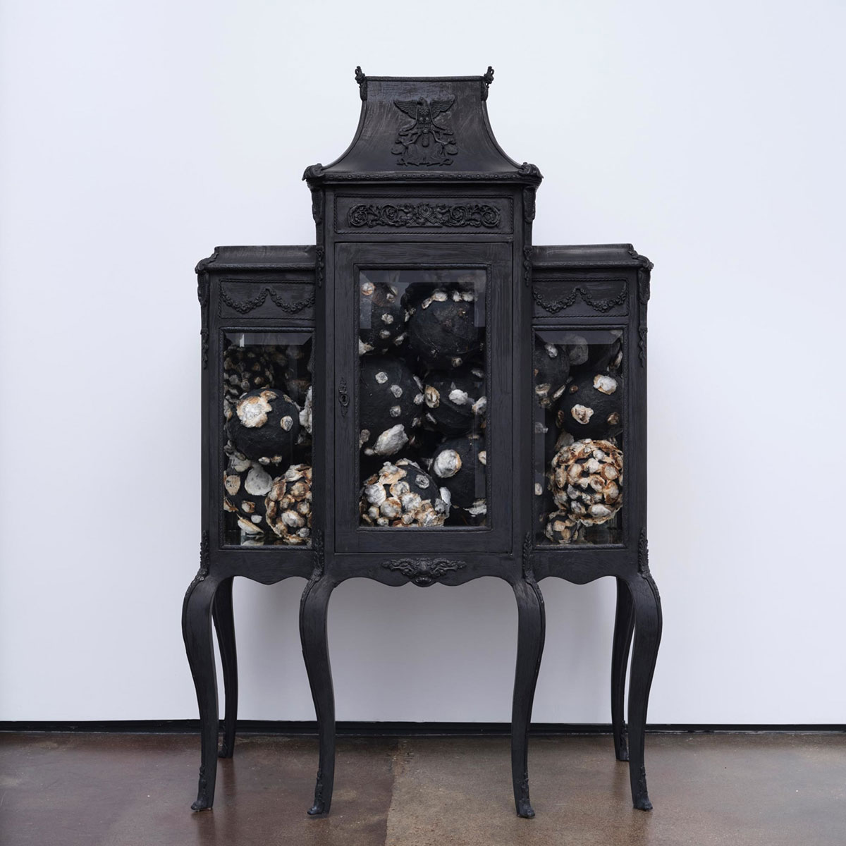 Nari Ward, Empire, 2023, Sterilized cotton, sugar, metal wire, stencil ink, furniture, 66 x 42 x 19 inches, 167.6 x 106.7 x 48.3 cm, Photo by Daniel Kukla, © Nari Ward. Courtesy the artist and Lehmann Maupin Gallery