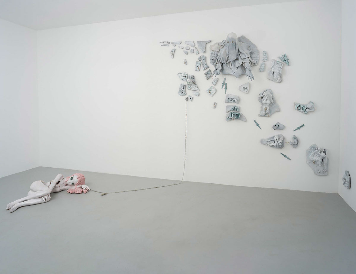 Apollinaria Broche, The Peace Room is closed for renovation, 2022 Glazed ceramic, silver, previous stones, Wall Installation: 102 3/8 x 141 3/4 x 12 5/8 inches 260 x 360 x 32 cm, Girl: 13 3/4 x 43 1/4 x 25 5/8 inches, 35 x 110 x 65 cm, © Apollinaria Broche, Courtesy the artist and Marianne Boesky Gallery