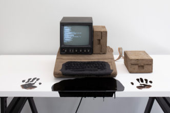American Artist, MOTHER OF ALL DEMOS III, 2022, Dirt, monochrome CRT monitor, computer parts, Linux operating system, subwoofer cable, wood, asphalt, 127 × 150,2 × 77,5 cm, Courtesy the artist and LABOR, Mexico