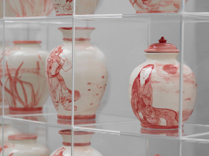 María Magdalena Campos-Pons, My Mother Told Me I am Chinese: China Porcelain (Detail), 2008, 40 Hand-painted Chinese porcelain vases on plexiglass shelf, video on LED screen, sound by Neil Leonard, Duration: 5:48 min, Shelf size: 200 x 355 x 106 cm, © María Magdalena Campos-Pons, Courtesy the artist and Galerie Barbara Thumm