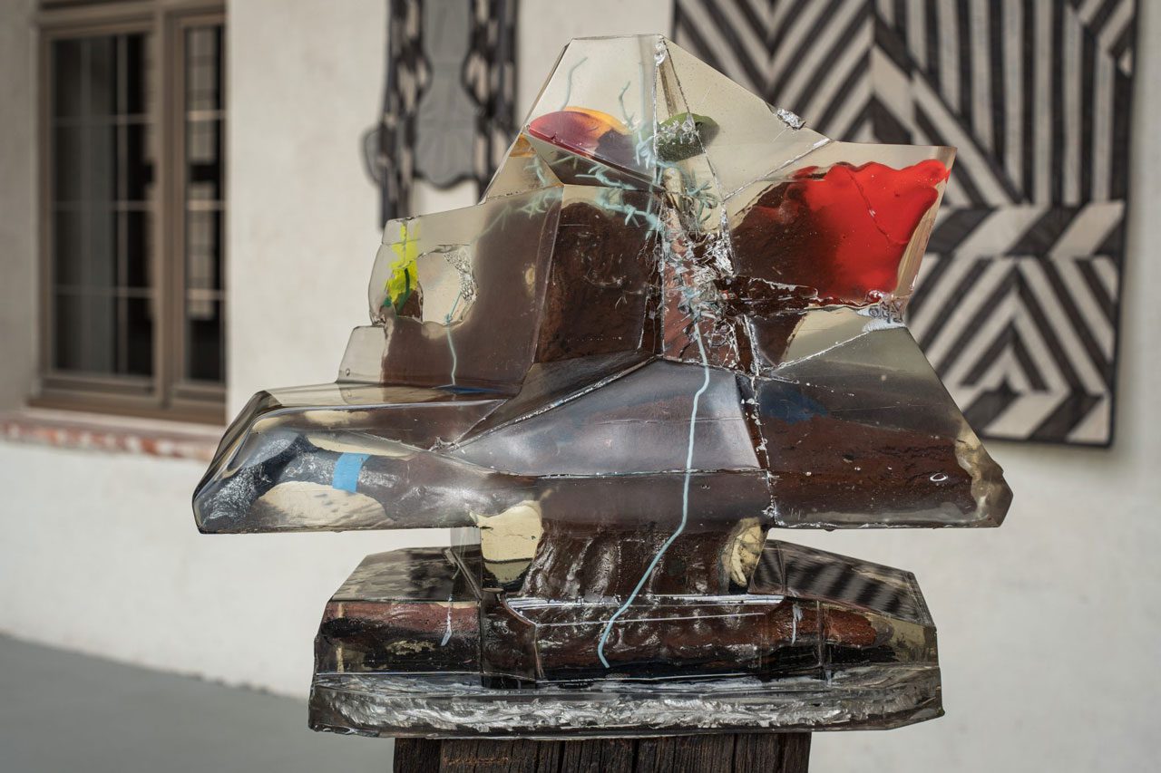 Petras Mazūras. History Is a Nightmare You Will Never Wake Up From, 2023. Mixed media, 58.5 × 49 × 29 cm and a fragment of a wooden wall: 102.3 × 29 × 25.5 cm (foreground). Photographer: Andrej Vasilenko