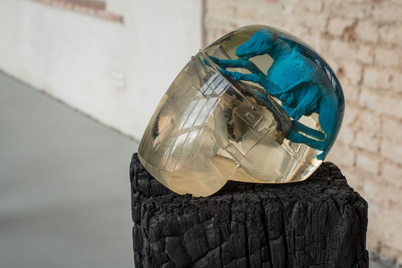 Petras Mazūras. Double Race, 2020. Mixed media, 27 × 20 × 37 cm and a fragment of a wooden wall: 102 × 28,5 × 23.5 cm. Photographer: Andrej Vasilenko