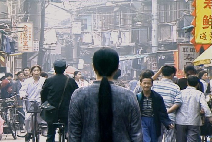 Kimsooja, A Needle Woman – Tokyo, 1990/00, one channel projection, silent, 6:33 min, loop, Galleria Raffaella Cortese, Milan – Albisola, video still, Courtesy Galleria Raffaella Cortese, Milan – Albisola and Kimsooja Studio