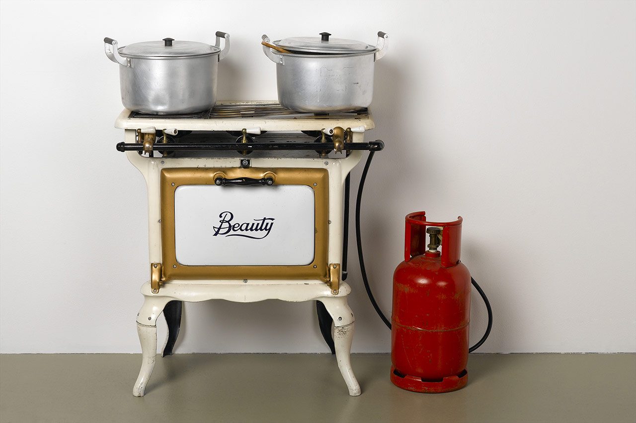 Rirkrit Tiravanija, untitled (beauty), 1994, 1994, Iron stove, 2 pots, knives, chopping board, bottle of gas, refrigerator Dimensions variable, © Rirkrit Tiravanija Photo: Paul Seewer