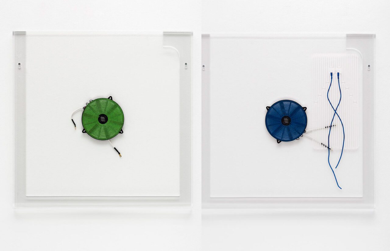 Left: Rosemarie Trockel, Made in Germany, 2024, Plexiglas, heating element (copper, plastic), paint (blue), silkscreen print, 31 7/8 x 31 7/8 x 1 1/8 inches (81 x 81 x 3 cm), © Rosemarie Trockel / Artists Rights Society (ARS), New York, Courtesy the artist, Gladstone Gallery and Sprüth Magers GalleryRight: Rosemarie Trockel, Made in Germany, 2024, Plexiglas, heating element (copper, plastic), paint (green), silkscreen print, 31 7/8 x 31 7/8 x 1 1/8 inches (81 x 81 x 3 cm), © Rosemarie Trockel / Artists Rights Society (ARS), New York, Courtesy the artist, Gladstone Gallery and Sprüth Magers Gallery