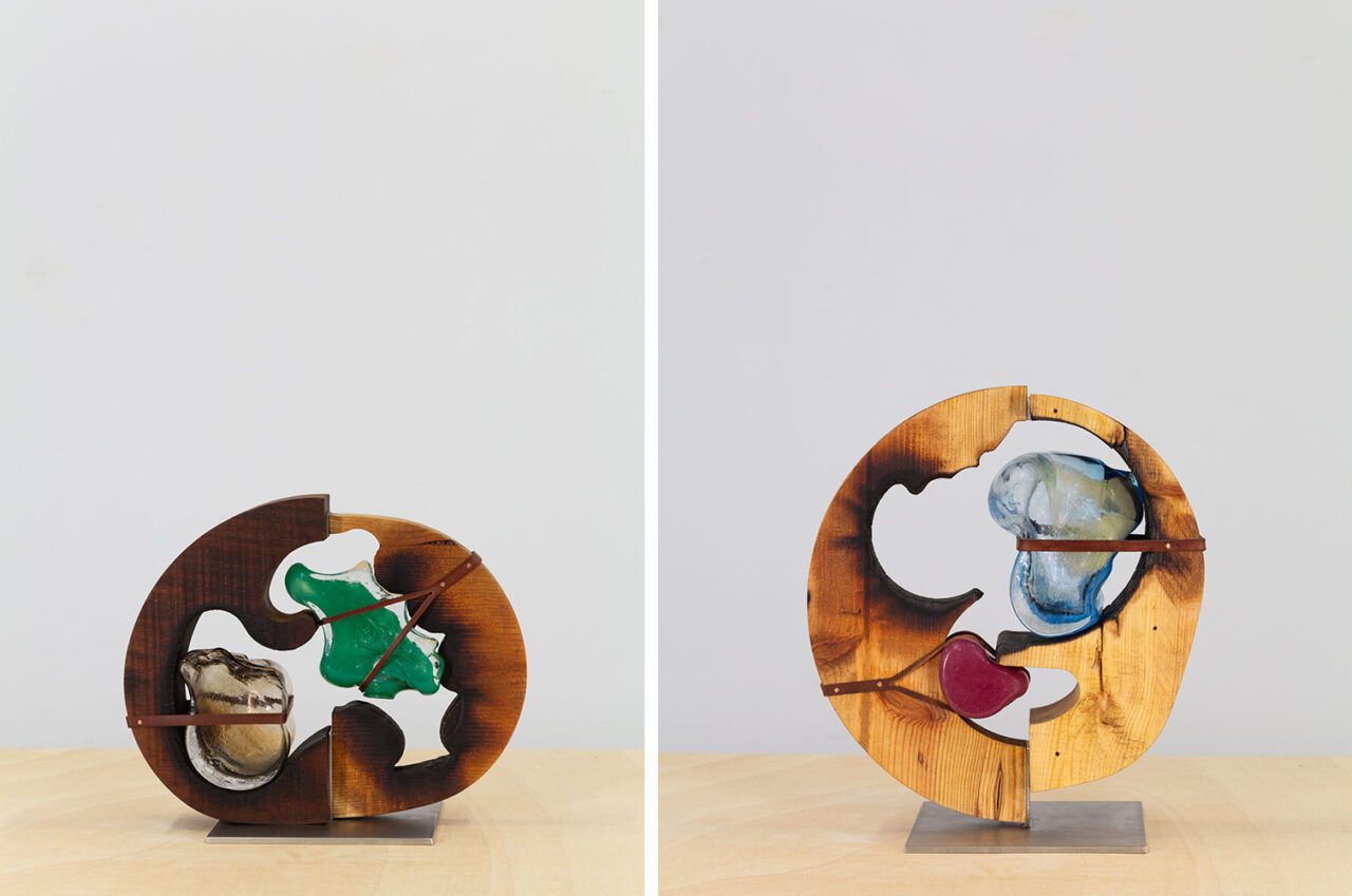Left: Leonor Serrano Rivas, Carcasa nº8, 2024, Blown glass, wood, 30 × 37 × 20 cm, Unique, © Leonor Serrano Rivas, Courtesy the artist and carlier|gebauer GalleryRight: Leonor Serrano Rivas, Carcasa nº9, 2024, Blown glass, wood, 39 × 34,5 × 20 cm, Unique, © Leonor Serrano Rivas, Courtesy the artist and carlier|gebauer Gallery