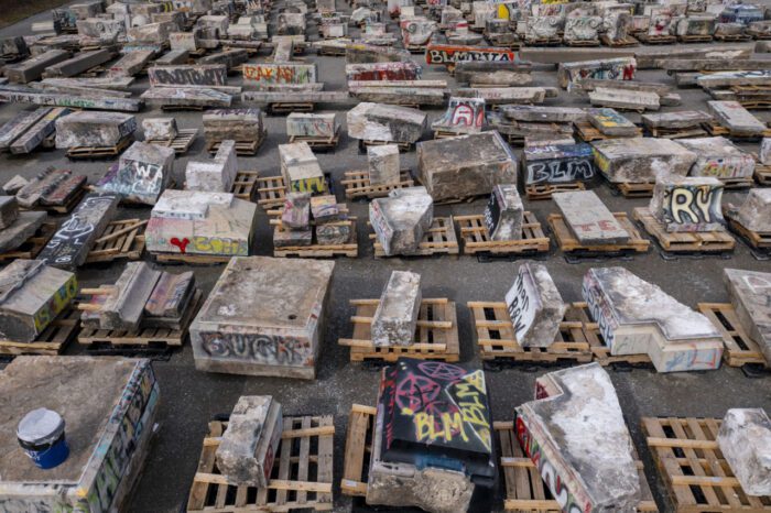 As seen from above, hundreds of pieces of what was the pedestal for the statue of Robert E. Lee in Richmond, 2022. Photo by and copyright Sanjay Suchak