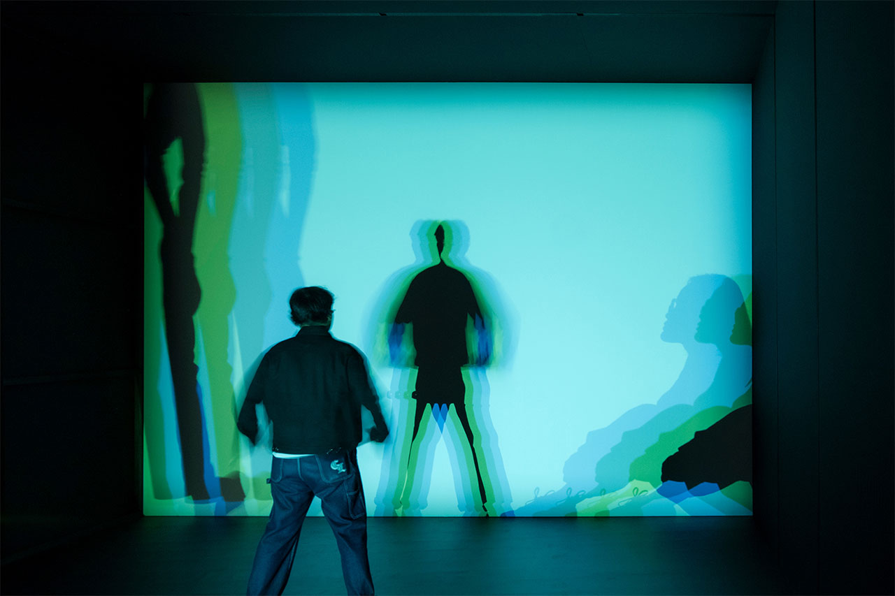 Olafur Eliasson, Multiple shadow house, 2010, Wood, metal, fabric, halogen lamps (orange, red, blue, green), glass, projection foil, transparent projection foil, Courtesy of Olafur Eliasson; neugerriemschneider, Berlin; Tanya Bonakdar Gallery, New York