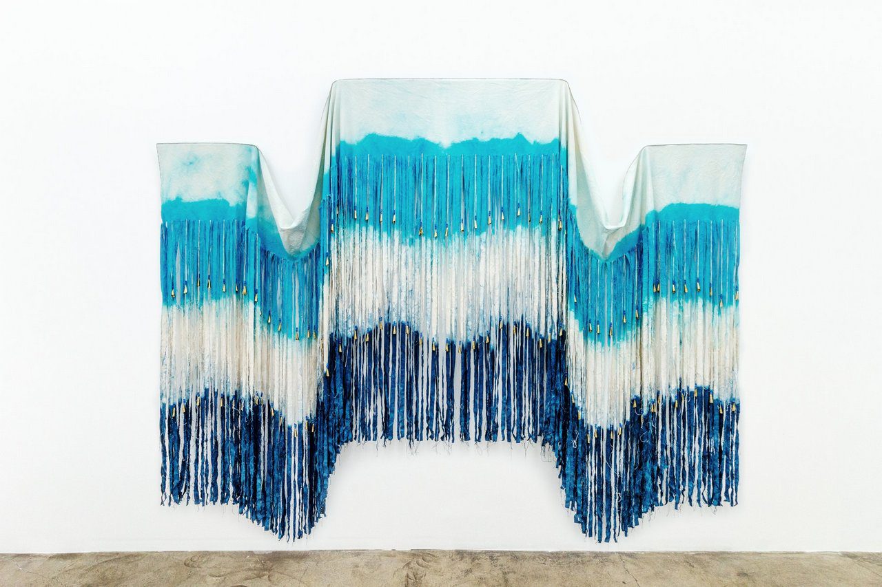 Chelsea Bighorn, Triple Point, 2025, canvas, dye, glass beads, artificial sinew, and jingle cones, 105 x 128 in. / 267 x 325 cm, © Chelsea Bighorn, Courtesy the artist and de boer Gallery