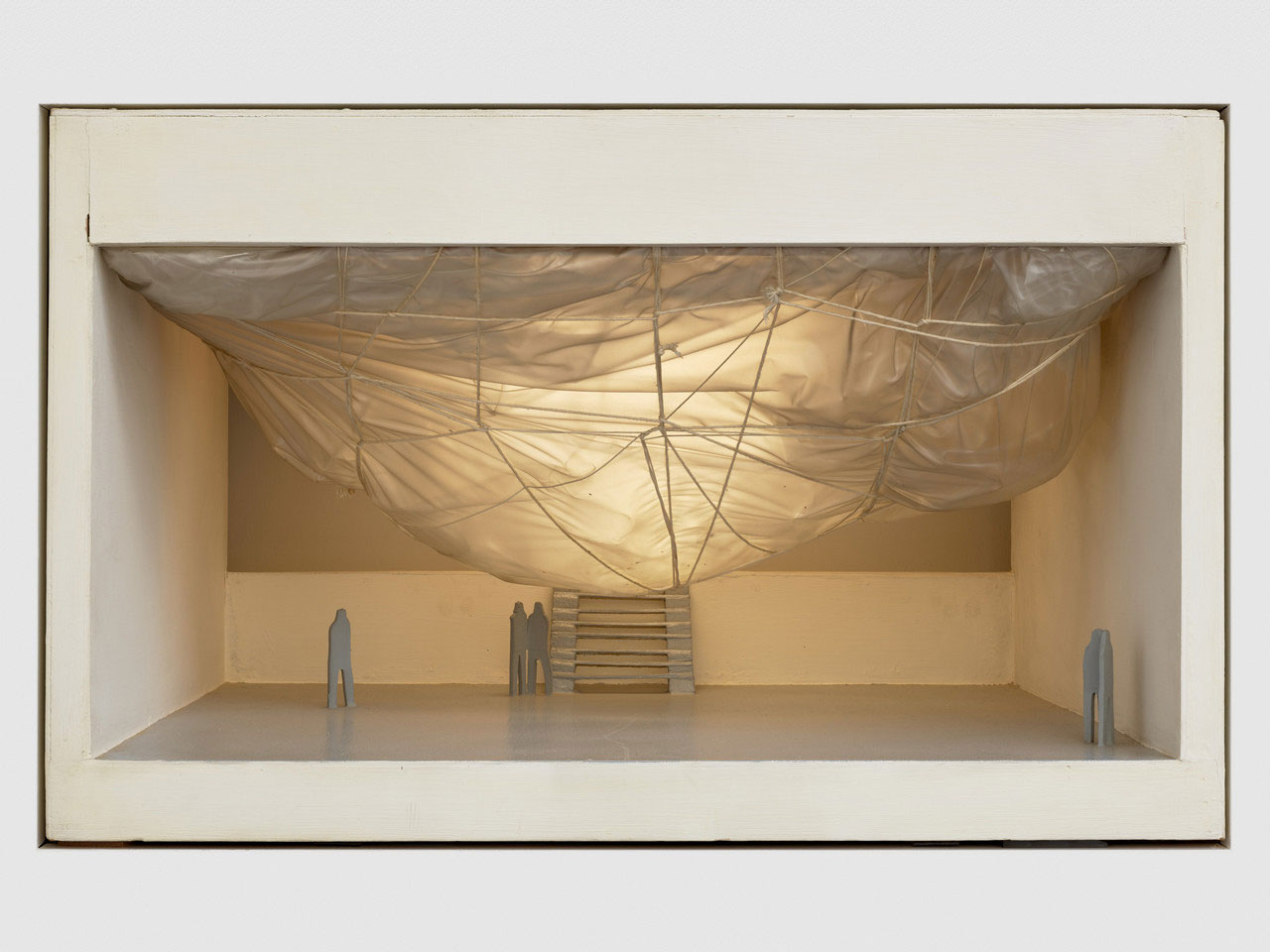 Christo and Jeanne-Claude, Air Package on a Ceiling (Project for the Institute of Contemporary Art, University of Pennsylvania, Philadelphia), 1968, Wood, paint, polyethylene, Mylar, twine, screws, and electric light, 17 x 27 1/2 x 27 1/8 inches (43.2 x 69.9 x 68.9 cm), © Christo and Jeanne-Claude Foundation, Photo: Prudence Cuming Associates Ltd, Courtesy Christo and Jeanne-Claude Foundation and Gagosian